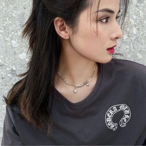Woman’s stylish chain necklace stars choker